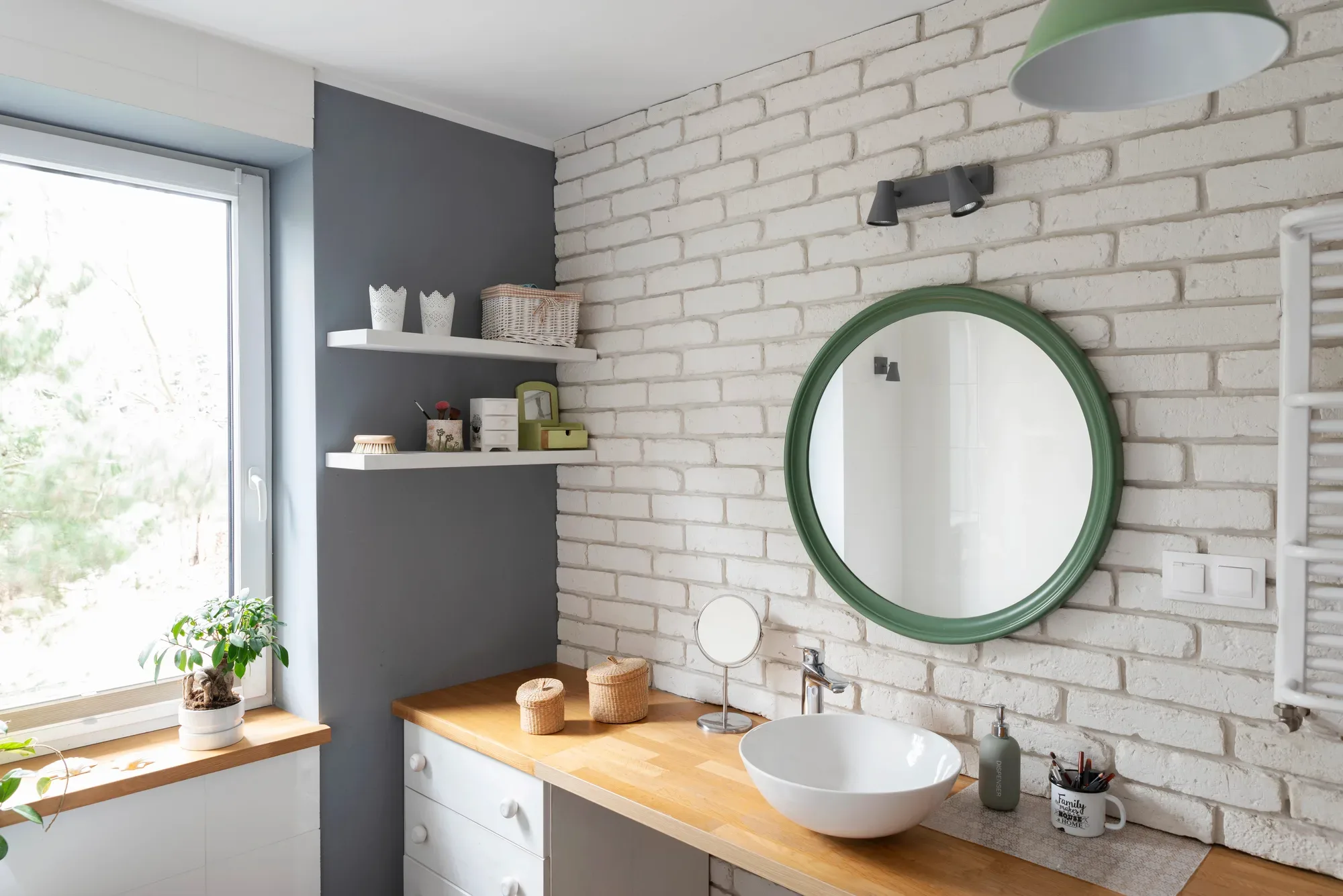 Custom-designed bathroom with feature mirror and timber vanity