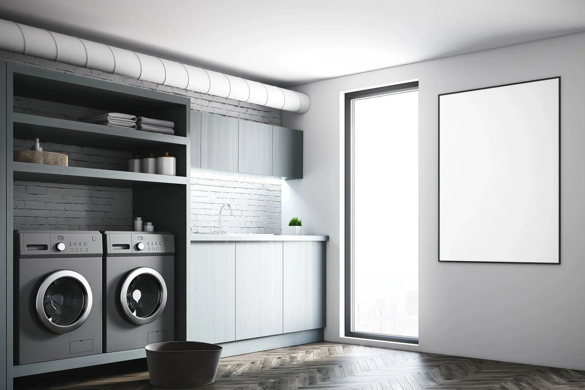 Renovated laundry with built-in cabinetry and stacked appliances